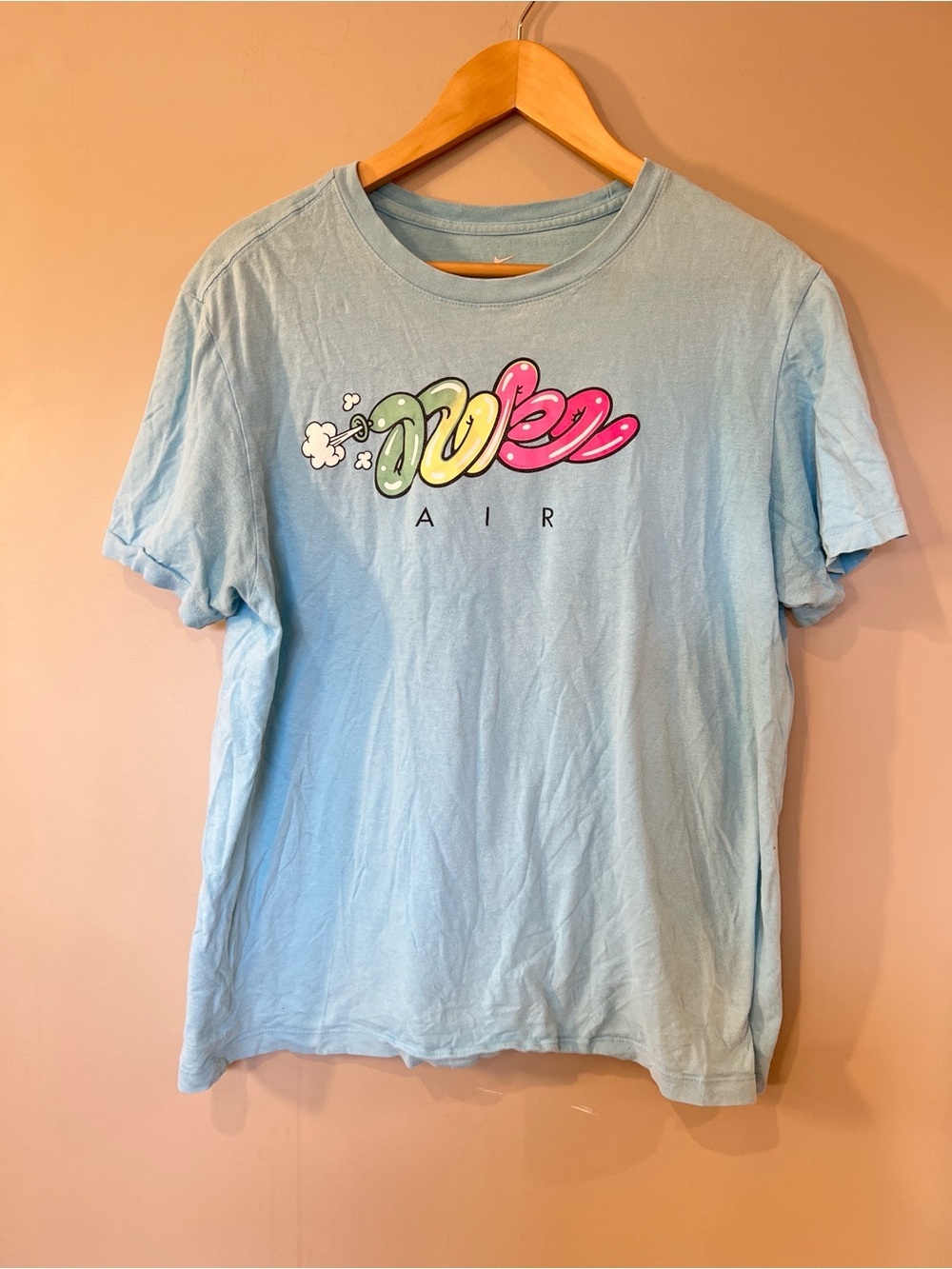 Nike Light Blue Graphic 'Air' Short Sleeve Tee with Multicolor Print
